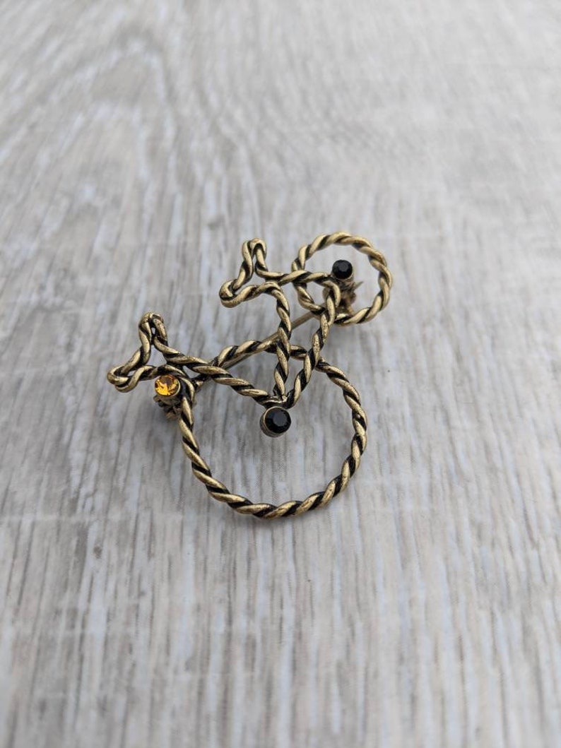 Jet Black Rhinestone and Bright Amber Colored Rhinestone Penny-Farthing or High Wheel Bicycle Brooch Bronze Tone Twisted Metal