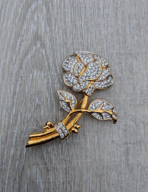 nolan miller brooch