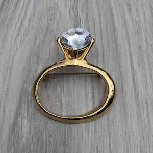 Oversized Clear Rhinestone and Gold Tone Metal Solitaire Ring Brooch