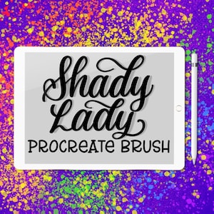 May include: A white tablet with a gray screen displaying the text "Shady Lady Procreate Brush" in black lettering. The tablet is on a purple background with colorful paint splatters.