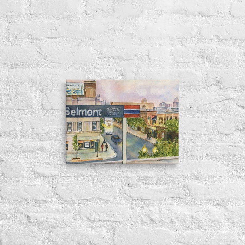 May include: A watercolor painting of a street scene in Chicago, Illinois. The painting features a street corner with a sign that reads "Belmont" and "3200 N 1000W". There are buildings on both sides of the street, and a few people walking on the sidewalk.