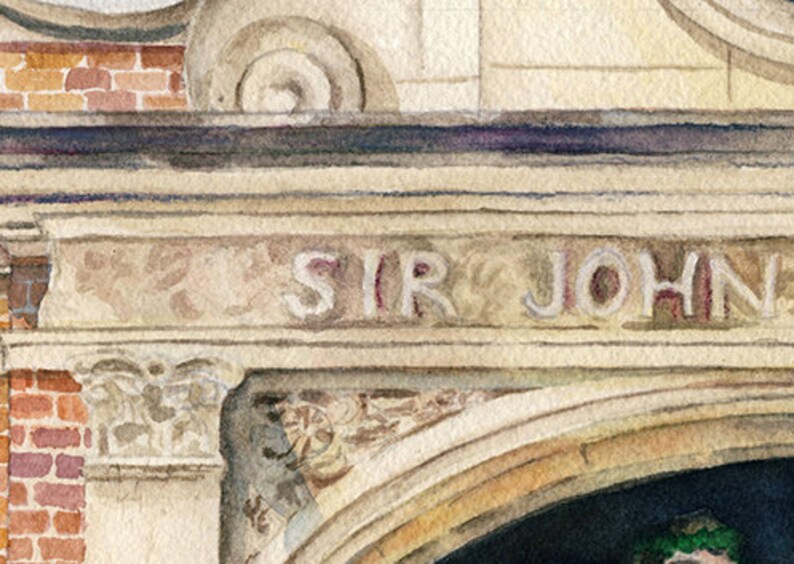 May include: A close-up of a stone archway with the inscription "SIR JOHN" above the entrance. The archway is decorated with intricate carvings and has a weathered, aged appearance.