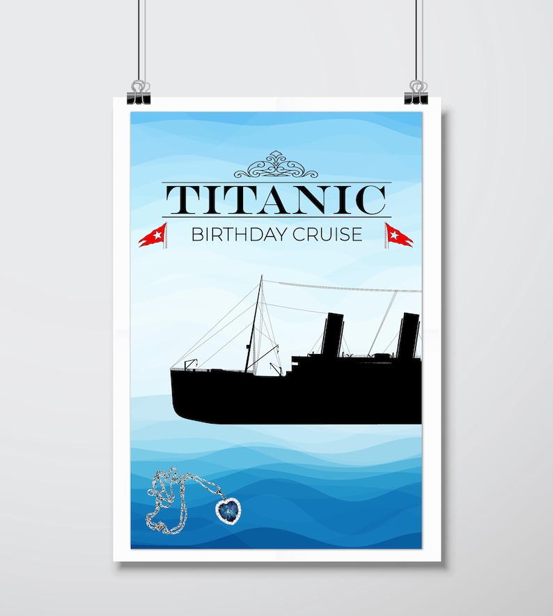 May include: A blue and white poster with the text "TITANIC BIRTHDAY CRUISE" and a silhouette of the Titanic ship. There are two red flags with white stars on the poster. A silver necklace with a blue heart pendant hangs in the water below the ship.