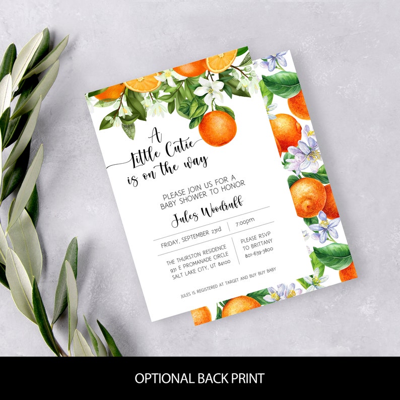 May include: A baby shower invitation featuring a watercolour design of oranges, leaves and flowers. The invitation reads "A Little Cutie is on the way" and includes the name "Jules Woodruff", date, time, location and RSVP details.