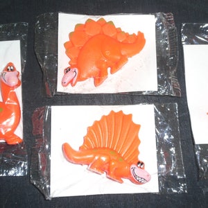 1992 Post Cereal Premiums Set of Four Dinosaurs (Orange) In Cello Packs