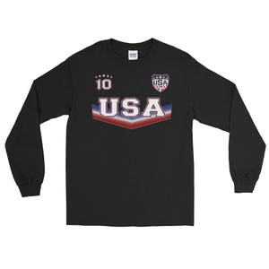 May include: Black long-sleeve shirt with a red, white, and blue USA graphic, a star pattern, and the number 10.