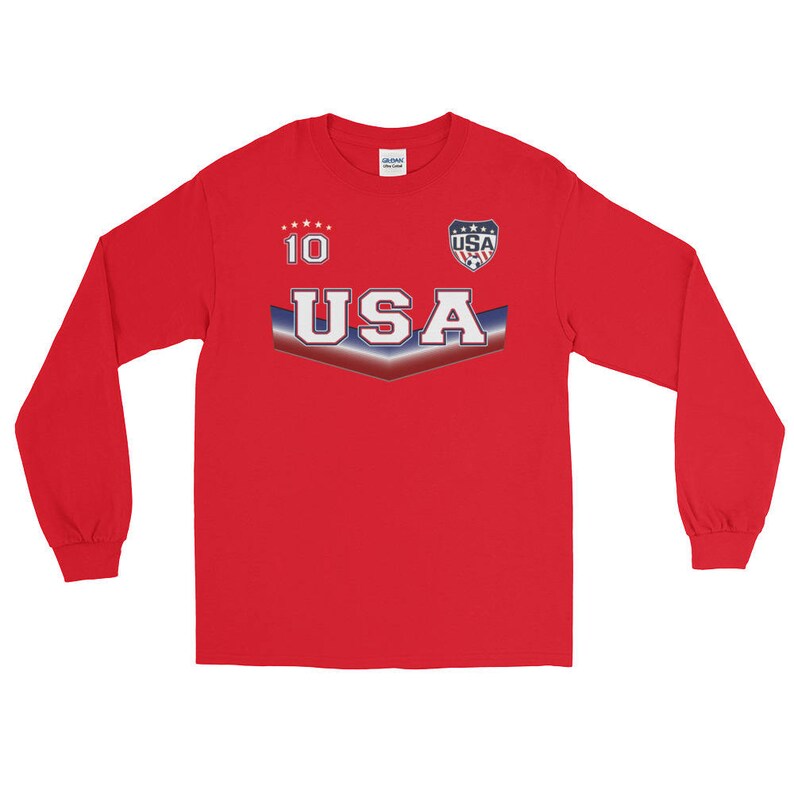May include: Red long-sleeve shirt with a white and blue USA graphic, a star pattern, and the number 10.