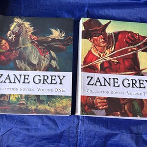 May include: Two Zane Grey Collection Novels books. Volume One features a man on a horse, Volume Two shows a cowboy roping. Both books have the author's name in large letters and are set against a colorful background.