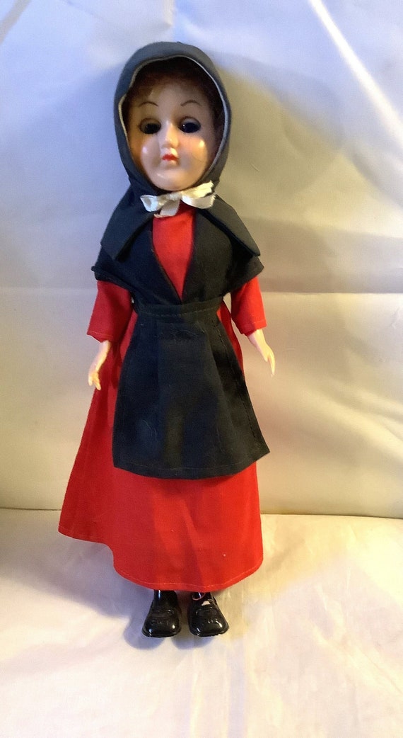 amish red dress This is how the Swartzentruber Amish women dress for church. They are allowed different dress colors. #examishgirl #amish #amishwomen #amishlife #lifeafteramish