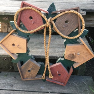 Handcrafted Wood Door/ Wall Hanger A Circle of Birt Houses with a Backdrop of Wood leaves.