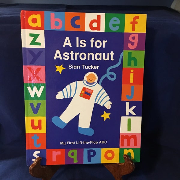 A es para astronauta: mi primer ABC con solapa por Sian Tucker