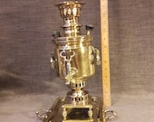 A genuine rare, small size, antique, Russian brass samovar and tray.
