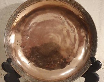 Antique Oriental copper plate or shallow bowl, round metal tray, very decorative.