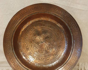 Copper Bowl. A fine antique Middle Eastern, entirely hand made bowl, decorated with engraving