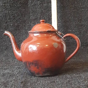 Vintage enamelled  teapot in distressed condition, still very decorative.
