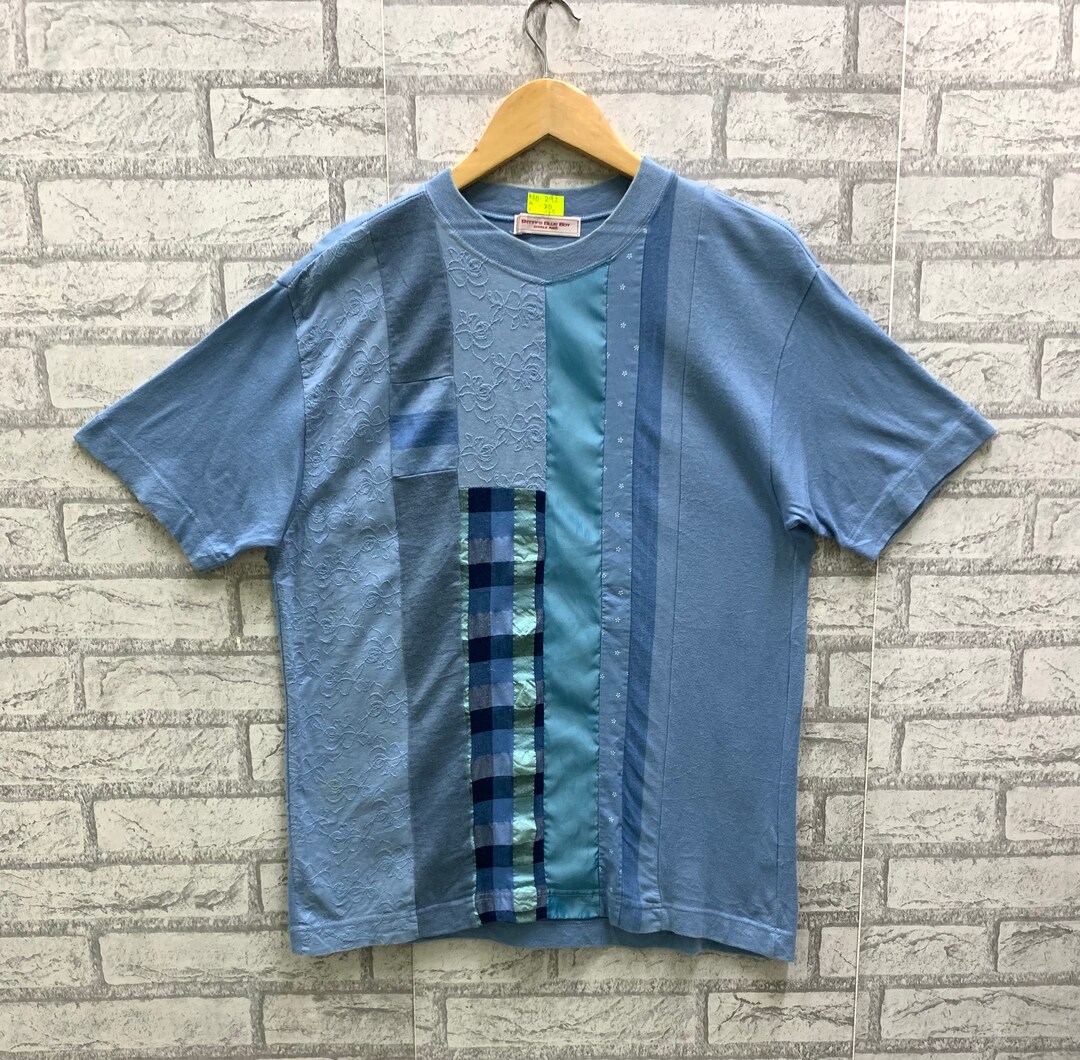 BETTY&#39;S BLUE - BETTY&#39;S BLUE キャラクタースウェット  ネイビー べティーズブルー 総柄 ジップアップ SHINJI ABE 2000年代 00s y2k 古着 【中古】WV2504-R0180 BETTY'S BLUE - BETTY'S BLUE キャラクタースウェット ネイビー