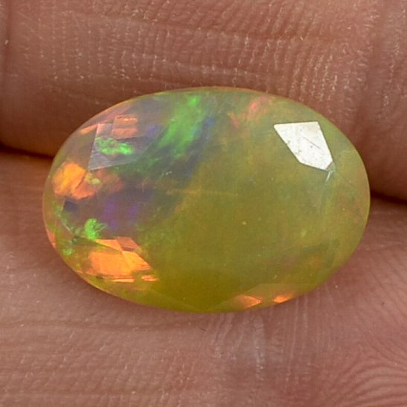 Natural 5.68 Ct Ethiopian Opal Oval Faceted Gemstone Flashy Multi Fire