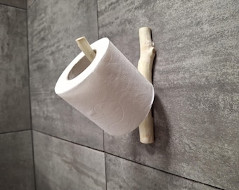 Soporte para papel higiénico con forma de rama de madera. Decoración rústica y ecológica para el baño.