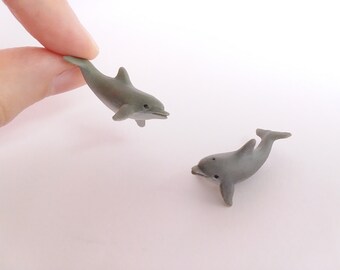 plastic dolphin figurines
