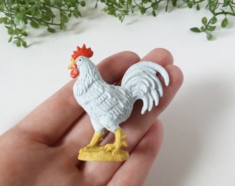 small plastic toy chickens