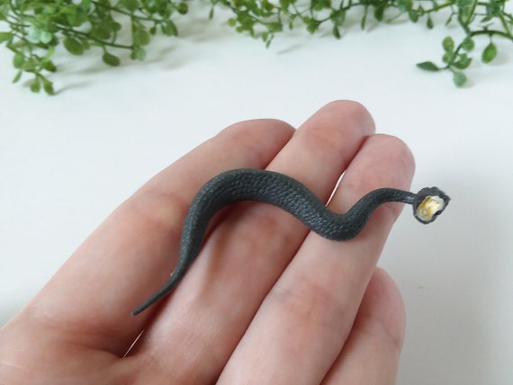 small plastic snakes