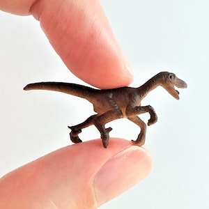 Tiny Raptor Figurine - Soft Plastic Dinosaur for Fairy Garden, Diorama, or Terrarium - Realistic Miniature Dino - Mini Velociraptor Figure