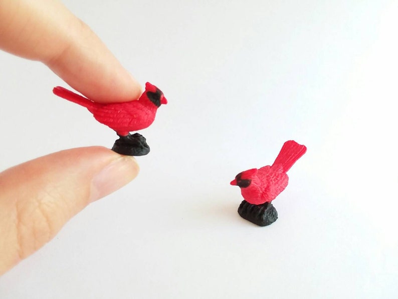 tiny cardinal figurines