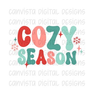 May include: A colorful graphic design with the text "COZY SEASON" in a retro style. The letters are in shades of red, pink, and teal with snowflake and star accents.