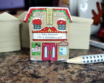 Hand painted mini Christmas village movie theater