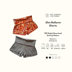 Könnte beinhalten: Zwei Paar Slim Rollover Shorts werden gezeigt. Ein Paar ist orange mit einem Blumenmuster, das andere grau. Das Bild enthält Text: "PDF Sewing Patterns" und "Slim Rollover Shorts". Die Shorts sind in den Größen XS, S, M, L und XL erhältlich.