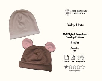 May include: Two baby hats are shown, one beige and one brown with pink ears. The image includes text that reads "Baby Hats" and "PDF Digital Download Sewing Pattern". The pattern offers 4 styles and is one size, suitable for babies 0+.