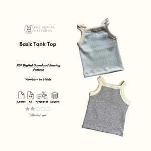May include: Two basic tank tops, one light blue and one grey, with cream-coloured trim. The tank tops are displayed on a light background. The image includes text that reads "Basic Tank Top" and "PDF Digital Download Sewing Pattern."