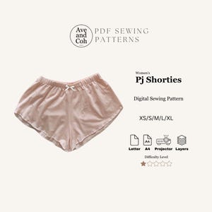 Puede incluir: Pantalones cortos de pijama rosa claro con un lazo blanco. La imagen incluye el texto "Ave and Coh PDF Sewing Patterns" y "Women's PJ Shorties Digital Sewing Pattern XS/S/M/L/XL".