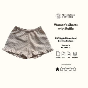 Puede incluir: Unos pantalones cortos de cuadros vichy en beige y blanco con un dobladillo con volantes. El texto dice: Ave and Coh PDF SEWING PATTERNS, Shorts with Ruffle, PDF Digital Download Sewing Pattern, XS,S,M,L,XL, Letter, A4, A0, Layers, Difficulty Level, y una estrella.