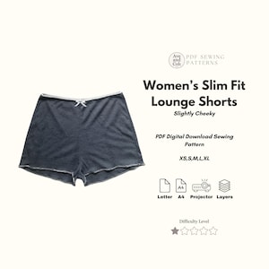 May include: Dark gray lounge shorts with white trim and a small bow at the waist. The shorts are part of a PDF digital download sewing pattern. The text on the image reads "Women's Slim Fit Lounge Shorts" and "Slightly Cheeky".