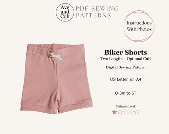 May include: A pair of dusty rose-colored biker shorts with a white bow at the waist. The image includes text that reads "Biker Shorts", "Digital Sewing Pattern", and "0-3m to 5T". The difficulty level is indicated by one star.