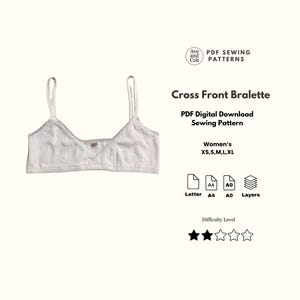 May include: A white bralette with thin straps and lace trim, presented as a PDF sewing pattern by Ave and Coh. The text includes Cross Front Bralette, PDF Digital Download Sewing Pattern, sizes XS, S, M, L, XL, and icons for Letter, A4, A0, and Layers.