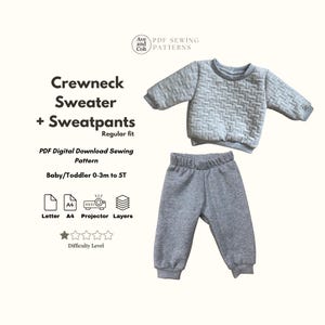 May include: A grey crewneck sweater and sweatpants set for babies and toddlers. The sweater features a textured design, and the trousers have an elasticated waist. The image also includes text that says "Crewneck Sweater + Sweatpants" and "PDF Digital Download Sewing Pattern".