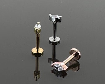 May include: Three different colored body jewelry pieces with clear gem stones. The jewelry is made of surgical steel and comes in gold, silver, and rose gold.