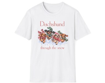 Camiseta con diseño floral de perro salchicha en la nieve