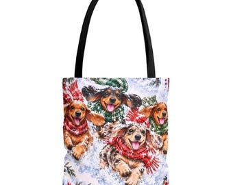 Bolso de mano con estampado de perros salchicha jugando en la nieve