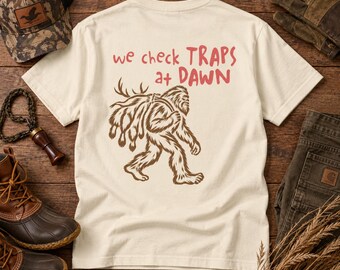 We Check Traps at Dawn Bigfoot Trapping T-Shirt