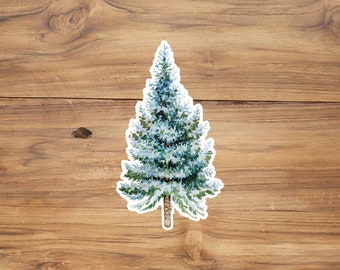 Peut inclure: Une illustration aquarelle d'un arbre de conifère enneigé avec un tronc brun. L'arbre est sur un fond en bois.