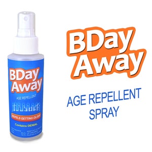 May include: A blue and white spray bottle with the text "BDay Away Age Repellent Repels Getting Older Contains DENIAL" on the label. The bottle is on a white background with the text "BDay Away AGE REPELLENT SPRAY" in orange and blue.