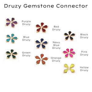 May include: A collection of gemstone connectors in various colors, including purple, red, blue, black, navy blue, green, orange, pink, and yellow. Each connector features a druzy gemstone design with gold-colored metal accents. The text "Druzy Gemstone Connector" is at the top.