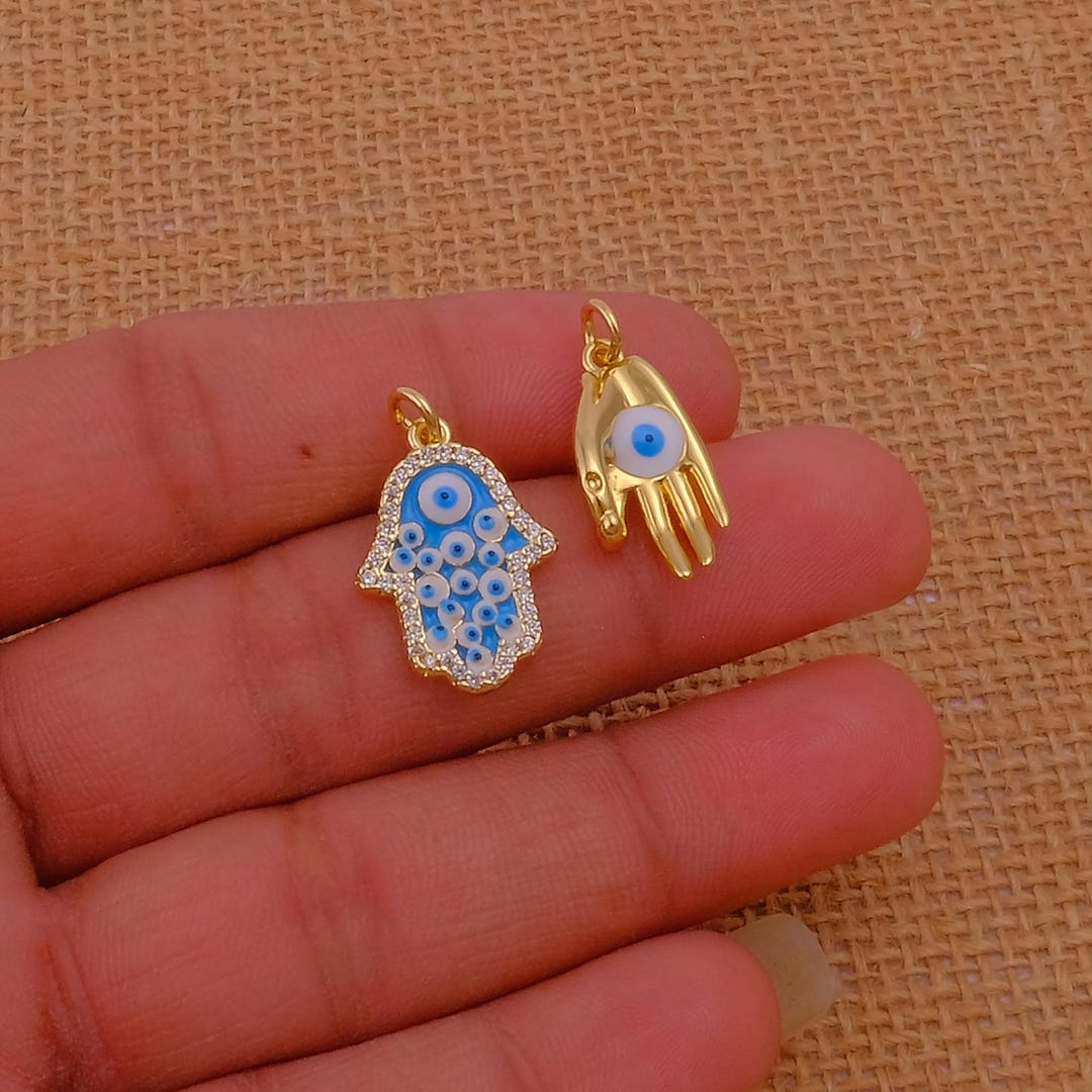 gold-plated-hamsa-hand-and-blue-evil-eye-charms-spiritual-protection