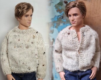 May include: A doll with brown hair wearing a cream-colored speckled knit sweater in the left image and a matching cream-colored speckled knit cardigan with two buttons in the right image. Both dolls are wearing dark blue denim pants.