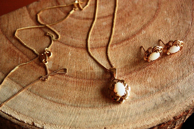 yellow gold Ethiopian opal necklace and stud earrings