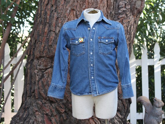 denim shirt with pearl snaps