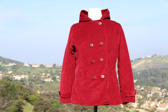 red raincoat with hood